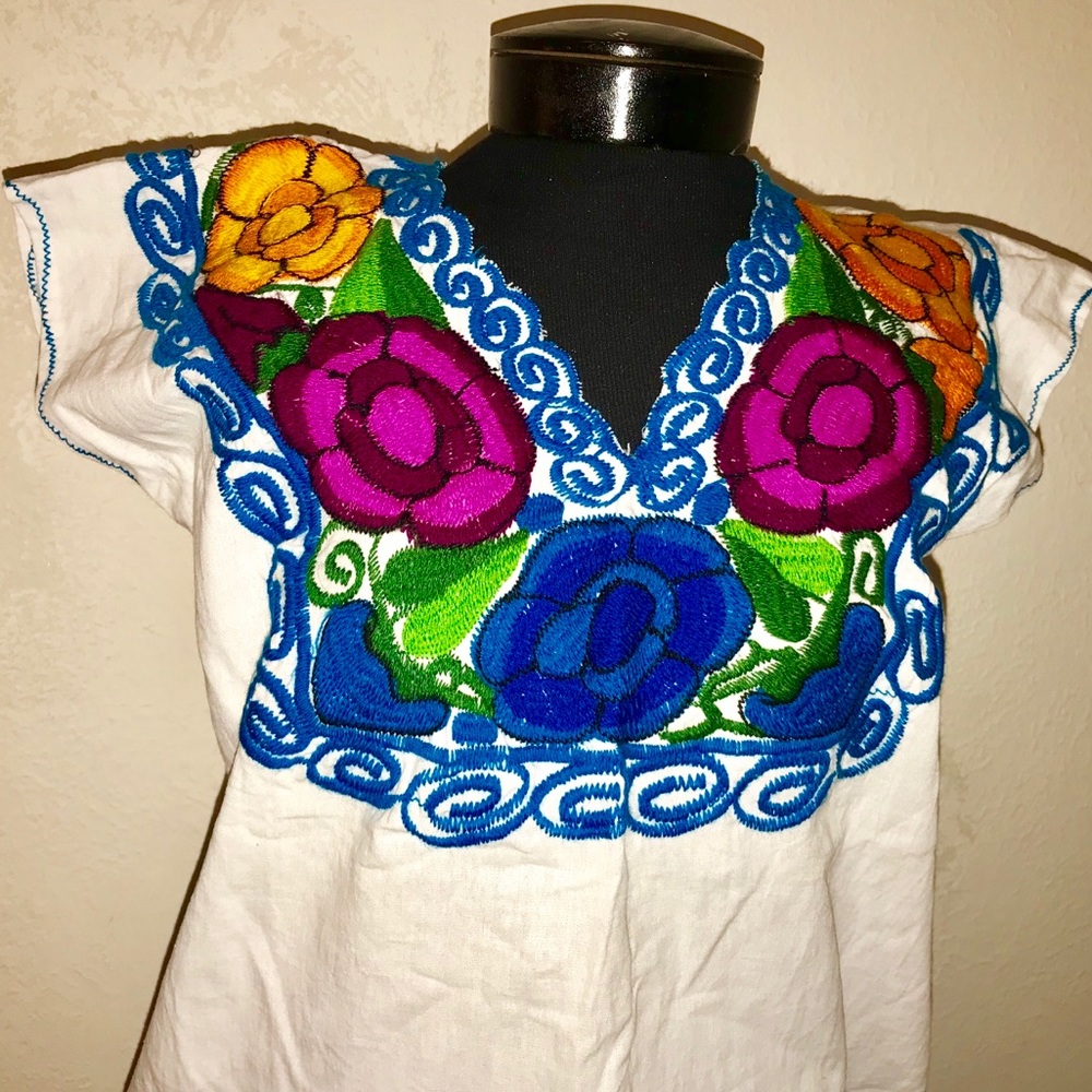 Vibrant hand embroidered tunic top